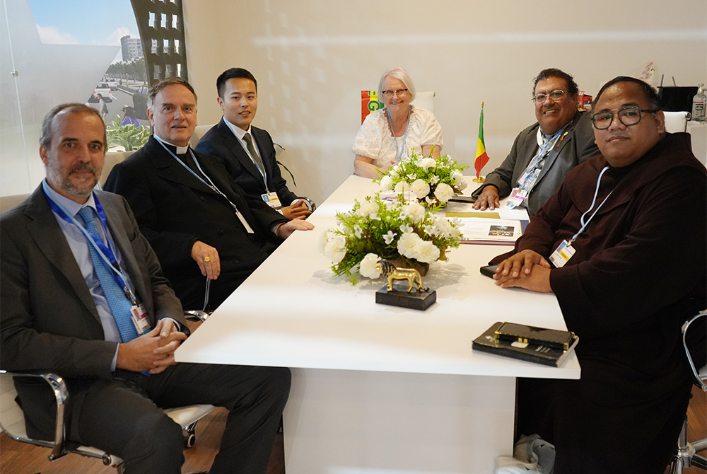 Members of the delegation from the Holy See to COP27 are seen before addressing the Laudato Si' Movement members Nov. 10 at the climate change summit convening in Sharm el-Sheikh, Egypt. (EarthBeat photo/Doreen Ajiambo)